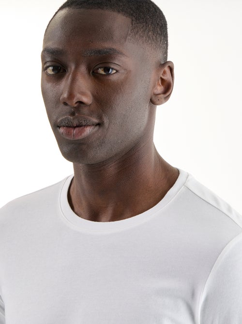 T-shirt a maniche lunghe tinta unita - Kiabi T-shirt a maniche lunghe tinta unita - Kiabi