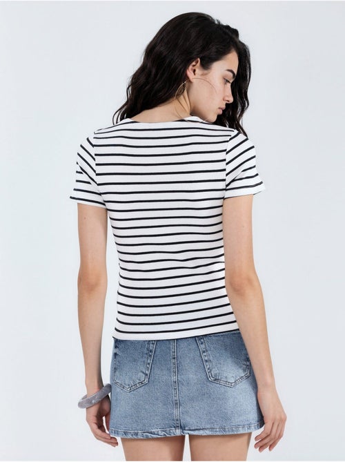 T-shirt a righe in cotone con girocollo busem - Kiabi T-shirt a righe in cotone con girocollo busem - Kiabi