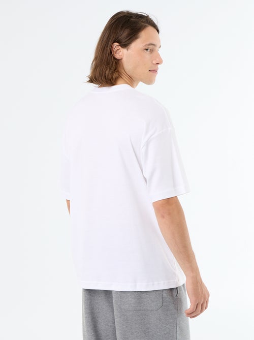 T-shirt a tinta unita a maniche corte e girocollo - Kiabi T-shirt a tinta unita a maniche corte e girocollo - Kiabi