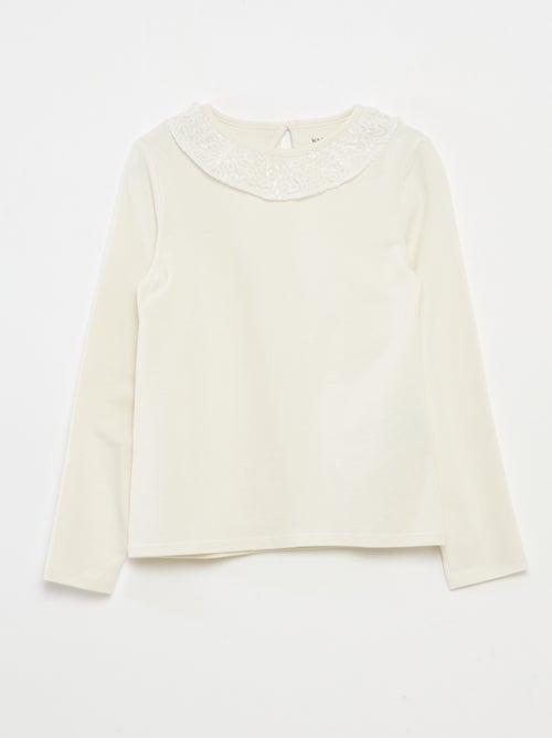 T-shirt a tinta unita con ampio collo a volant e paillettes - Kiabi