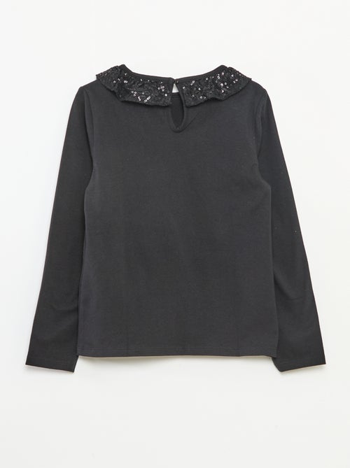 T-shirt a tinta unita con ampio collo a volant e paillettes - Kiabi