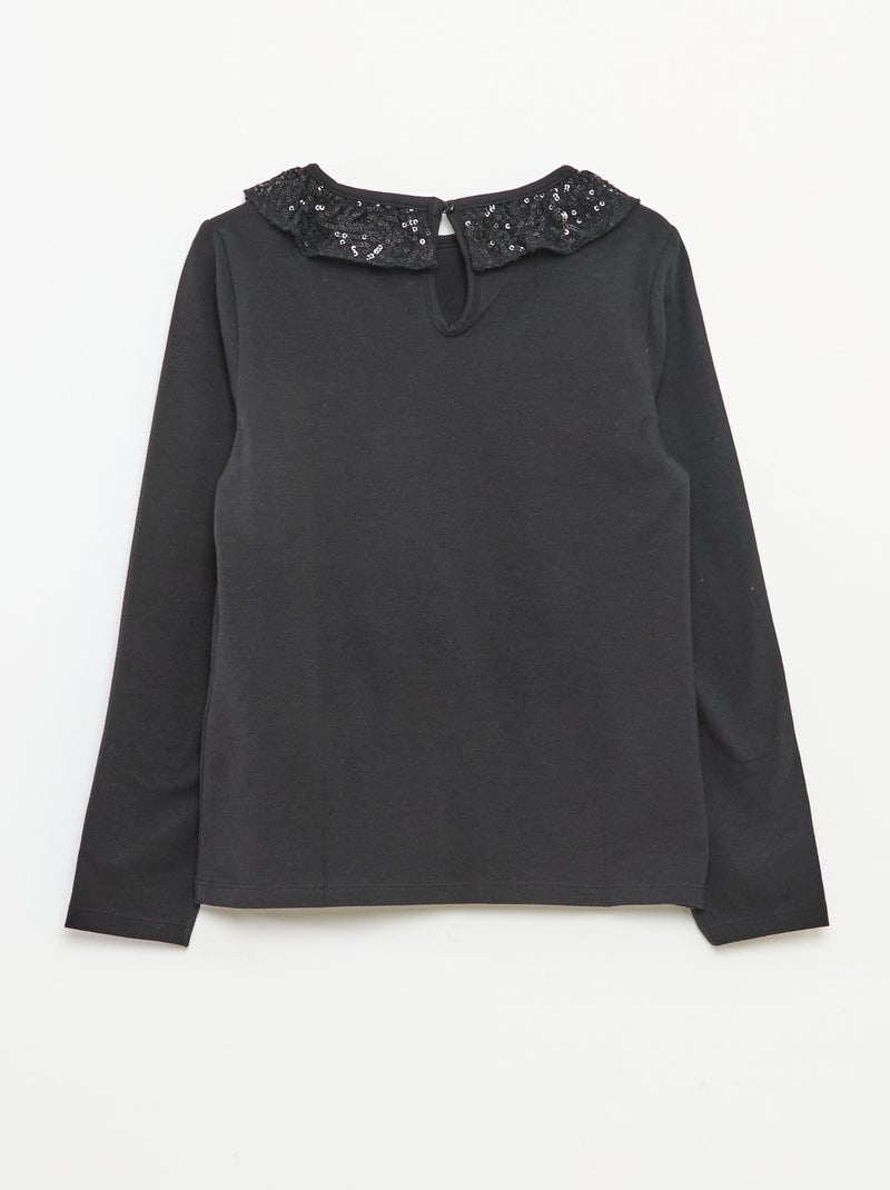 T-shirt a tinta unita con ampio collo a volant e paillettes Nero - Kiabi