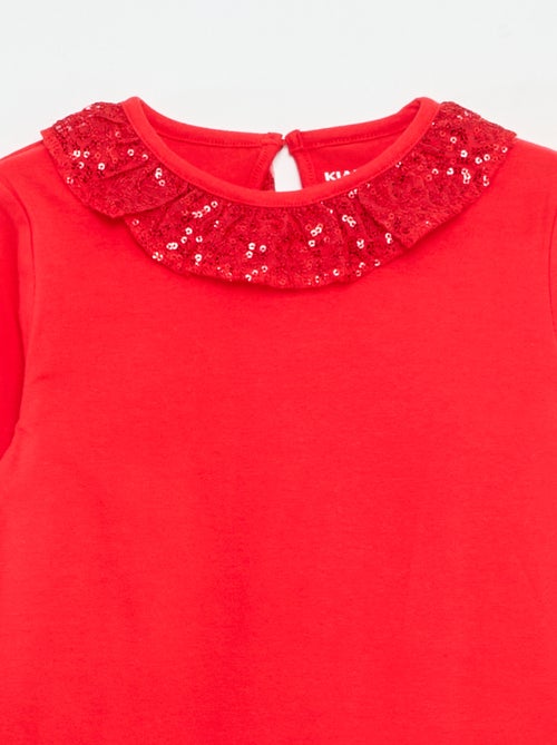 T-shirt a tinta unita con ampio collo a volant e paillettes - Kiabi