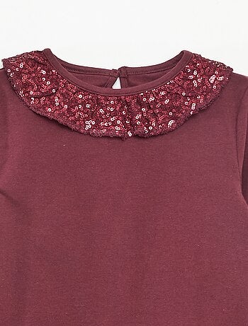 T-shirt a tinta unita con ampio collo a volant e paillettes