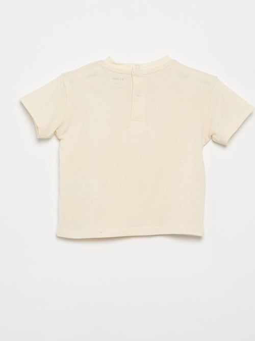 T-shirt a tinta unita con fiori fantasia sul colletto - Kiabi