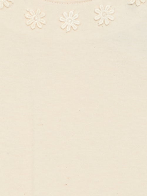 T-shirt a tinta unita con fiori fantasia sul colletto - Kiabi