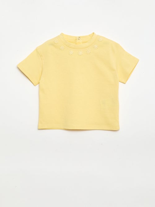 T-shirt a tinta unita con fiori fantasia sul colletto - Kiabi