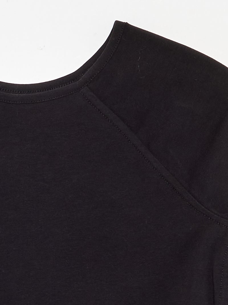 T-shirt a tinta unita con maniche raglan Nero - Kiabi