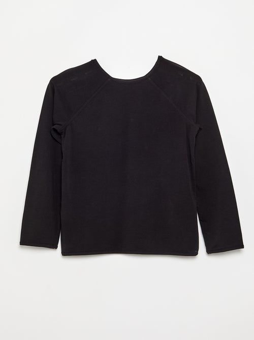 T-shirt a tinta unita con maniche raglan - Kiabi T-shirt a tinta unita con maniche raglan - Kiabi