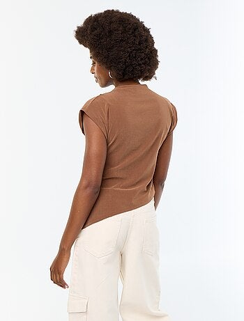 T-shirt asimmetrica senza maniche