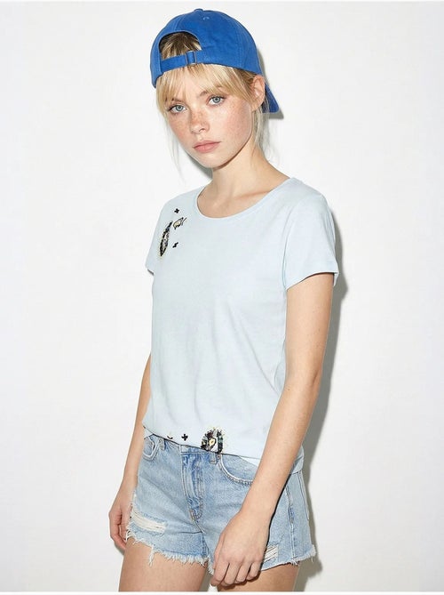 T-shirt basic con collo a u ricamato lucci - Kiabi T-shirt basic con collo a u ricamato lucci - Kiabi