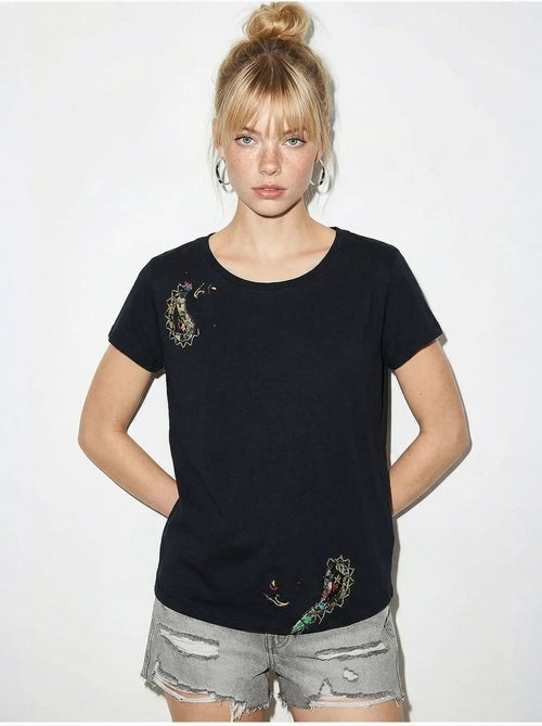 T-shirt basic con collo a u ricamato lucci - Kiabi T-shirt basic con collo a u ricamato lucci - Kiabi