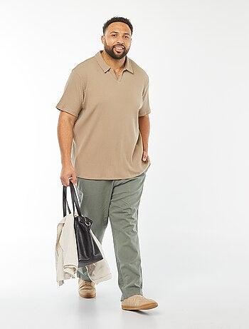 T-shirt con colletto a polo in maglia a coste