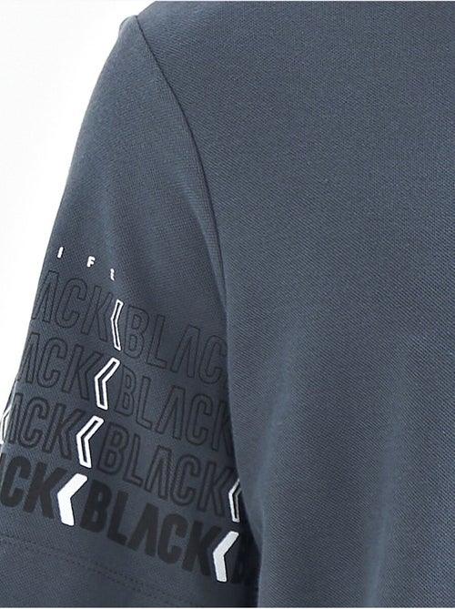 T-shirt con colletto polo stampata tommy - Kiabi T-shirt con colletto polo stampata tommy - Kiabi
