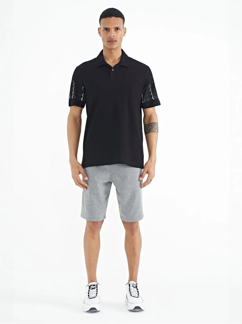 T-shirt con colletto polo stampata tommy Nero - Kiabi