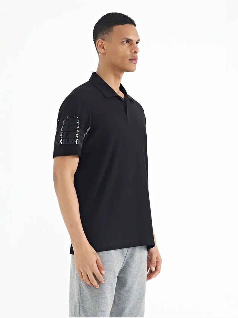 T-shirt con colletto polo stampata tommy Nero - Kiabi