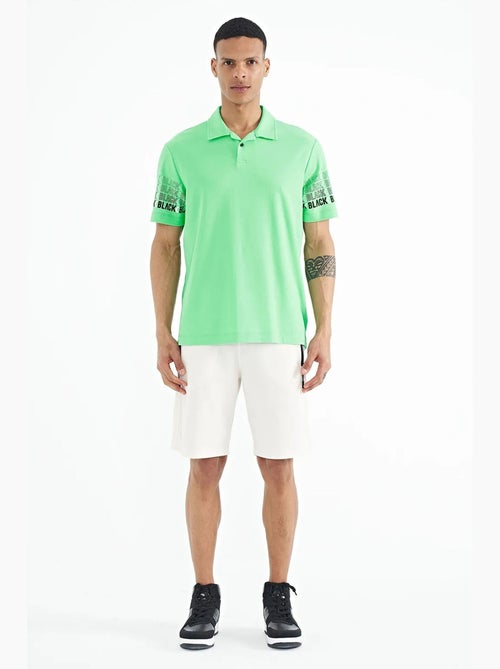 T-shirt con colletto polo stampata tommy - Kiabi T-shirt con colletto polo stampata tommy - Kiabi