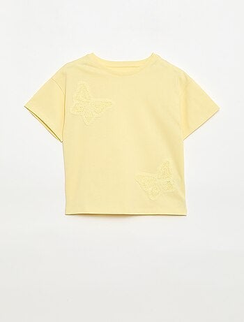 T-shirt con fiori in macramè