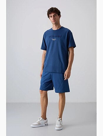 T-shirt con logo oversize in cotone e poliestere tommy