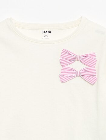 T-shirt con nodi decorativi a maniche lunghe