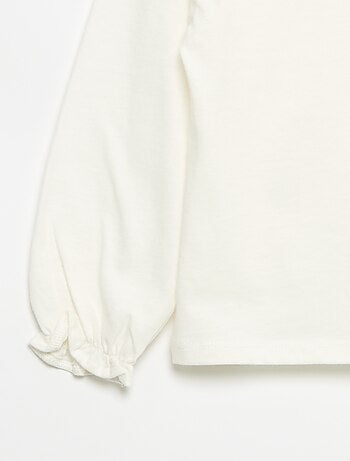 T-shirt con nodi decorativi a maniche lunghe