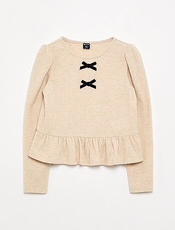 T-shirt con nodi e balza in vita