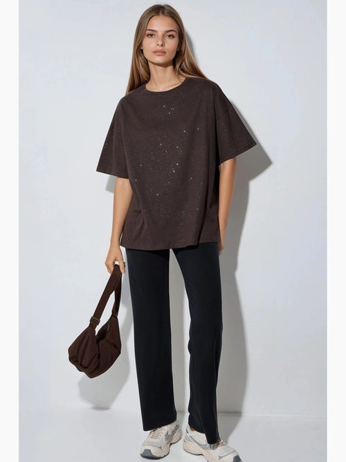 T-shirt con paillettes, girocollo e maniche corte busem - Kiabi T-shirt con paillettes, girocollo e maniche corte busem - Kiabi
