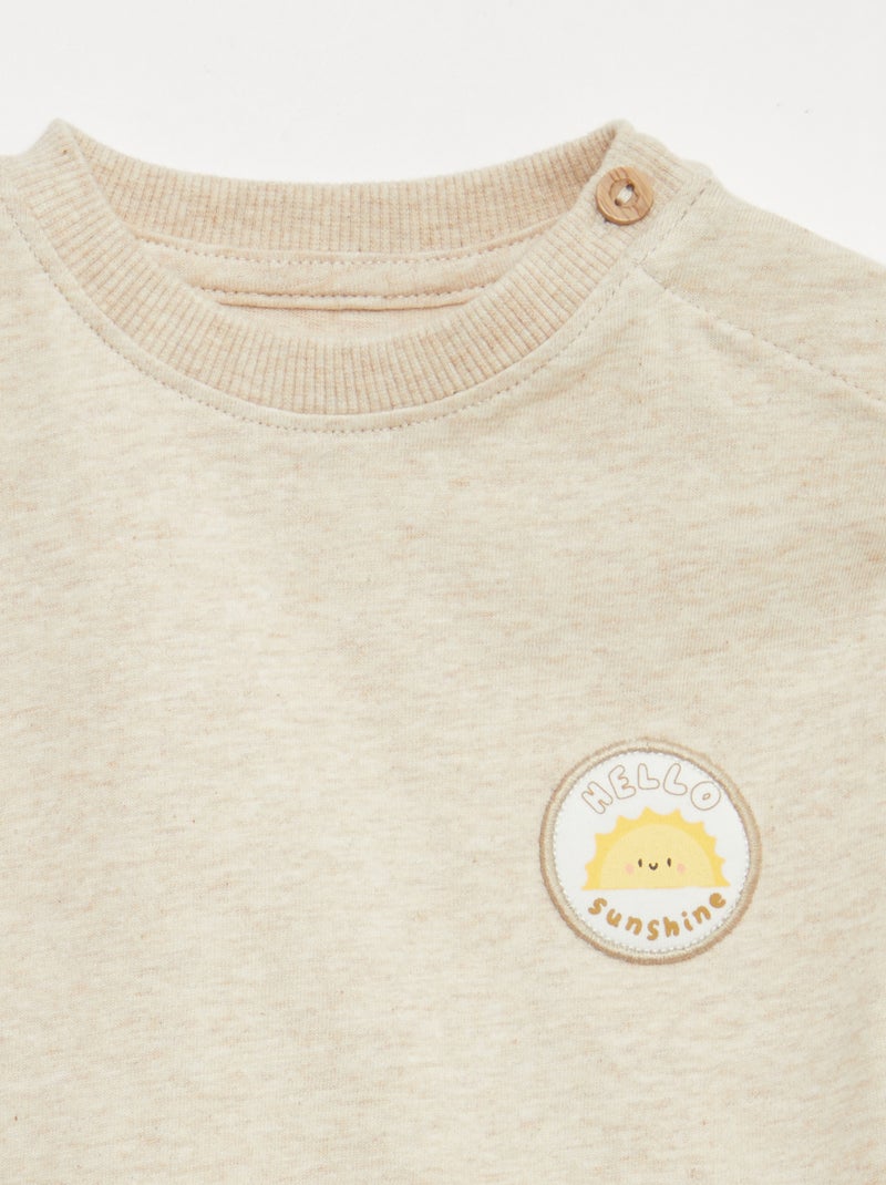 T-shirt con ricamo sul petto Beige - Kiabi