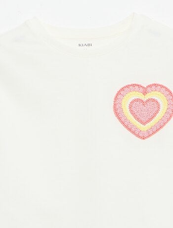 T-shirt con ricamo sul petto