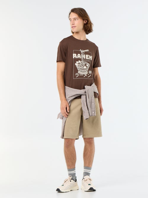 T-shirt con stampa fantasia a maniche corte - Kiabi T-shirt con stampa fantasia a maniche corte - Kiabi