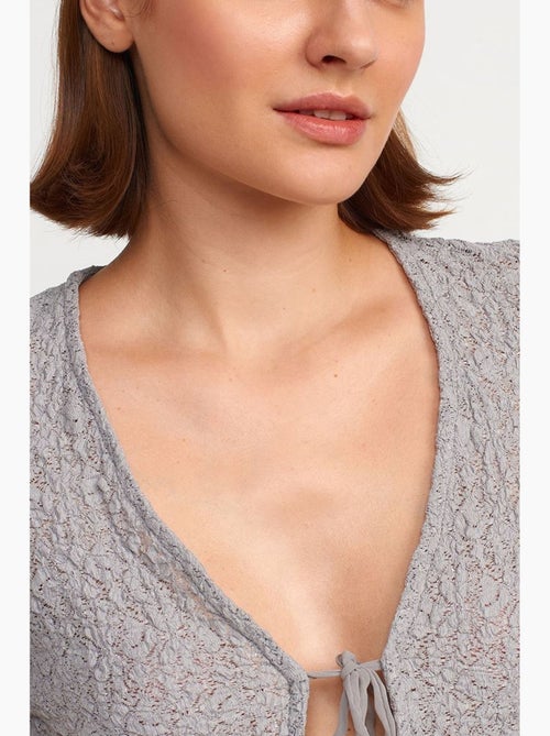 T-shirt corta aderente in pizzo manica corta con laccio davanti dilvin - Kiabi