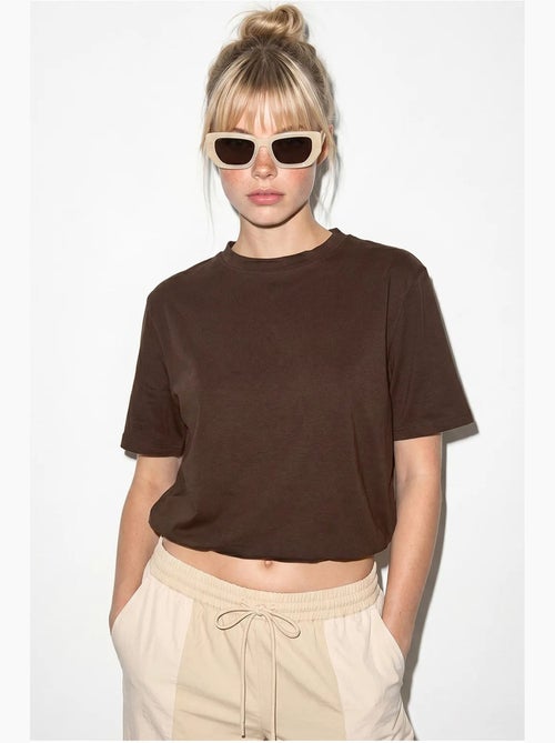 T-shirt corta da donna con girocollo lucci - Kiabi T-shirt corta da donna con girocollo lucci - Kiabi