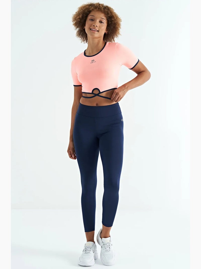 T-shirt crop elasticizzata con girocollo tommy Corallo - Kiabi