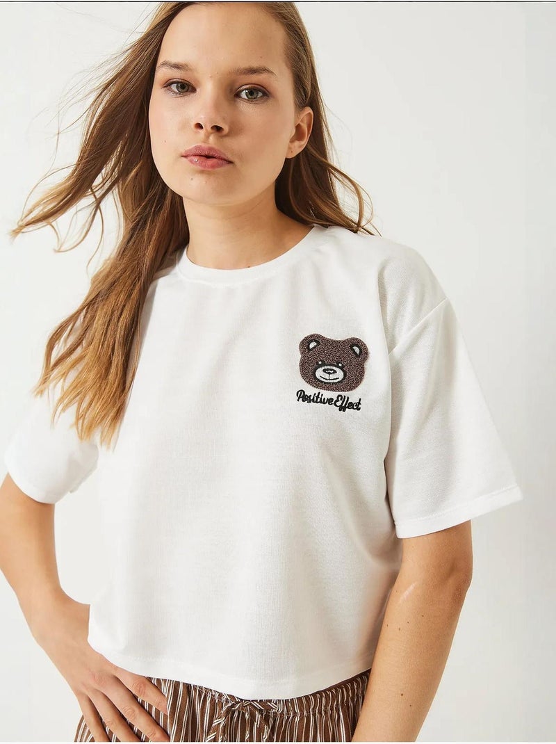 T-shirt crop ricamato con girocollo lucci Bianco - Kiabi