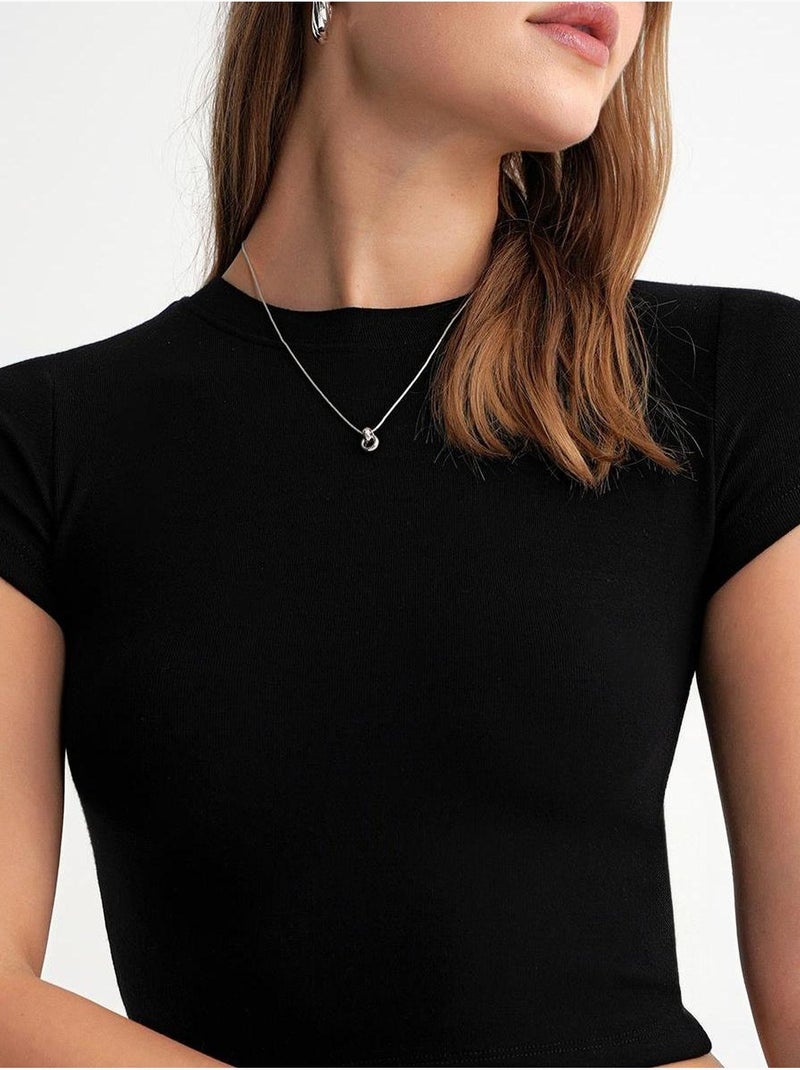 T-shirt cropped in maglia aderente mixray Nero - Kiabi