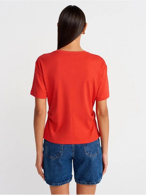 T-shirt da donna in cotone con girocollo e spacco dilvin - Kiabi T-shirt da donna in cotone con girocollo e spacco dilvin - Kiabi