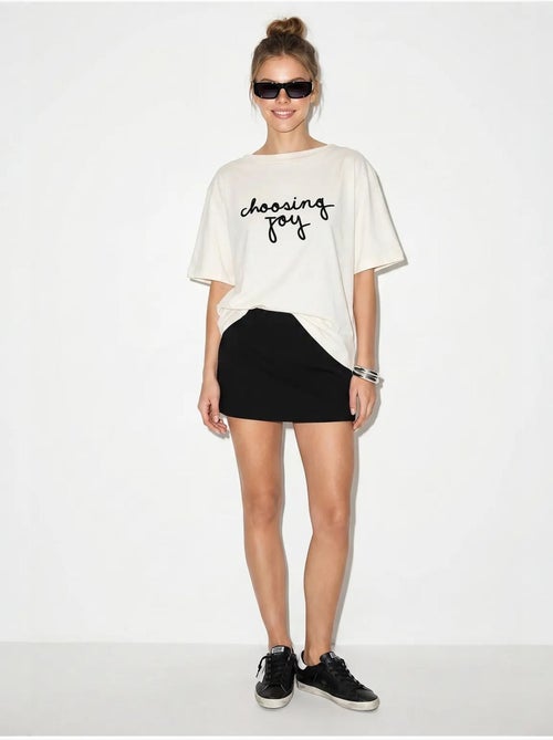 T-shirt da donna in cotone con scollo a barca e stampa lucci - Kiabi