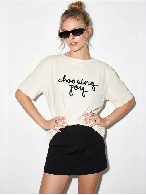 T-shirt da donna in cotone con scollo a barca e stampa lucci - Kiabi