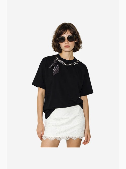 T-shirt da donna in cotone ed elastan lucci - Kiabi T-shirt da donna in cotone ed elastan lucci - Kiabi