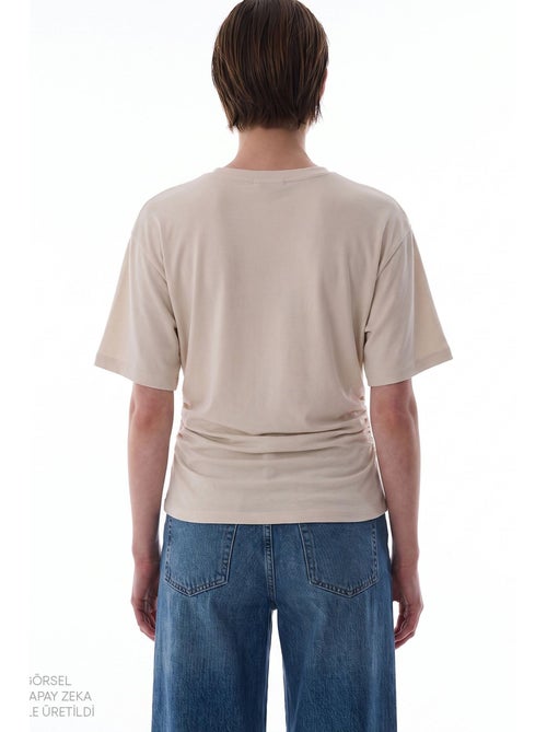 T-shirt da donna in modal con dettaglio in vita e arricciature penti - Kiabi T-shirt da donna in modal con dettaglio in vita e arricciature penti - Kiabi