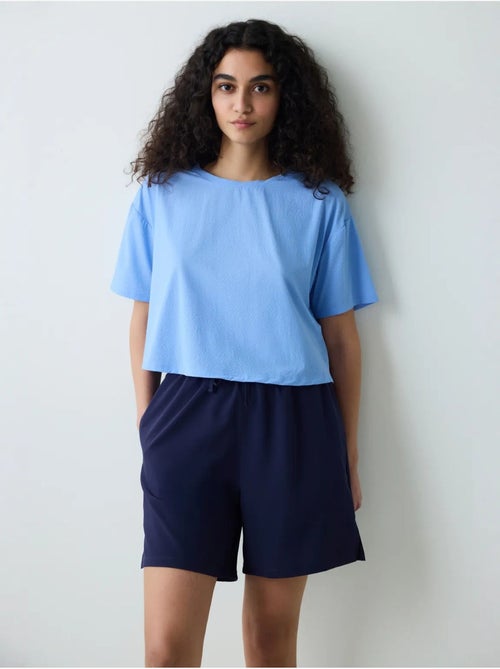 T-shirt donna con dettaglio sul retro penti - Kiabi T-shirt donna con dettaglio sul retro penti - Kiabi