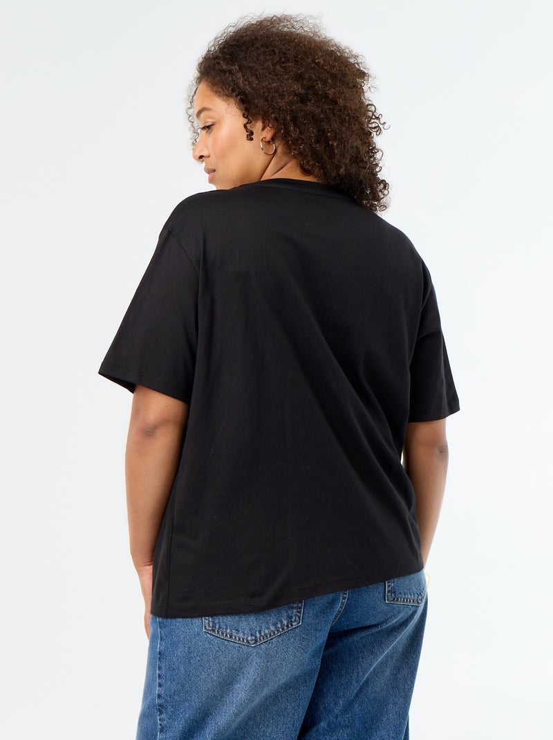 T-shirt drappeggiata con gioiello dorato a forma di spilla Nero - Kiabi
