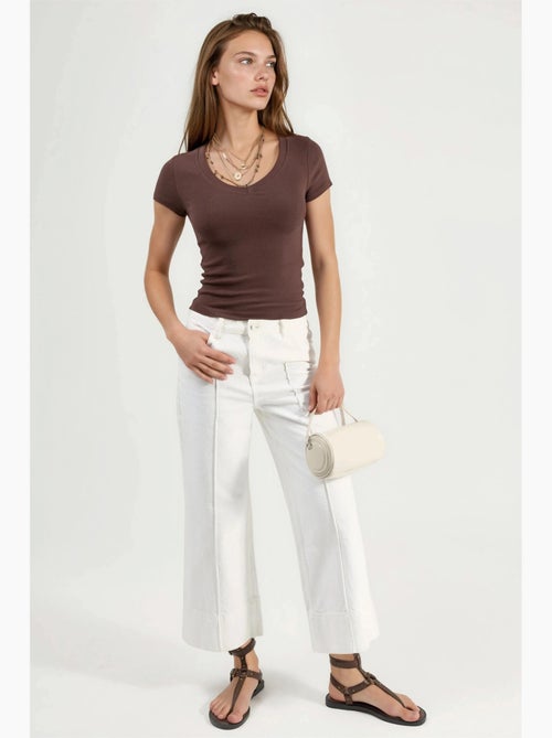 T-shirt elastica a maniche corte con scollo a v busem - Kiabi T-shirt elastica a maniche corte con scollo a v busem - Kiabi