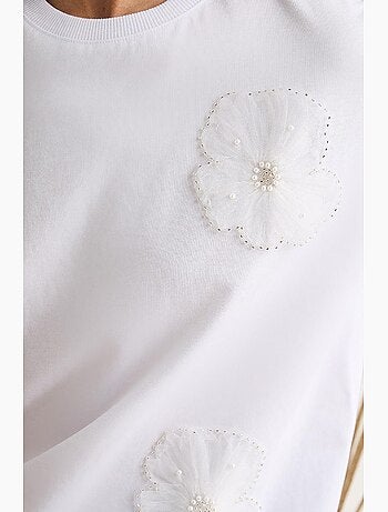 T-shirt girocollo a maniche corte con accessorio floreale lucci