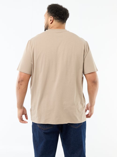 T-shirt girocollo a tinta unita in jersey da uomo - Kiabi T-shirt girocollo a tinta unita in jersey da uomo - Kiabi