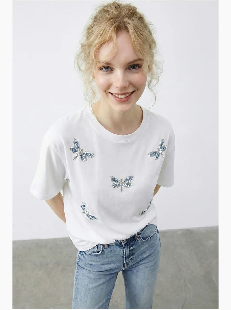T-shirt girocollo a vestibilità comoda con ricamo lucci Bianco - Kiabi
