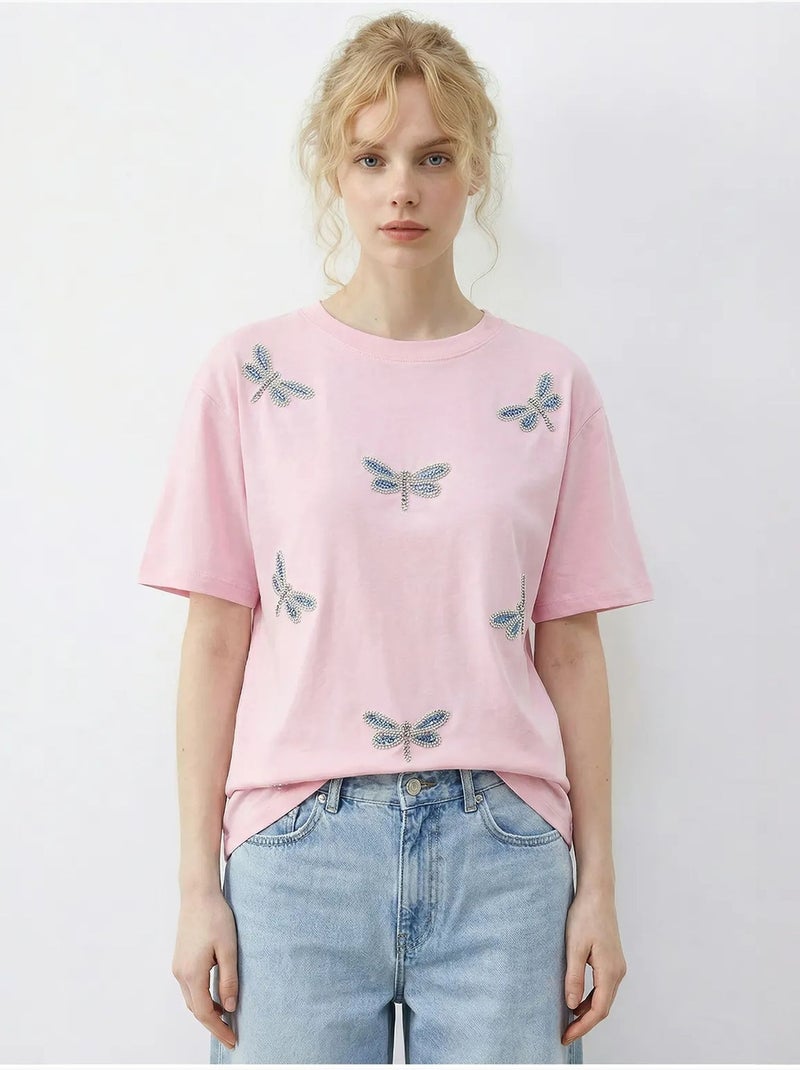 T-shirt girocollo a vestibilità comoda con ricamo lucci Rosa chiaro - Kiabi