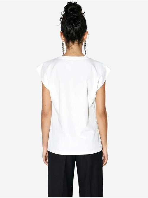T-shirt girocollo con cut-out lucci - Kiabi T-shirt girocollo con cut-out lucci - Kiabi