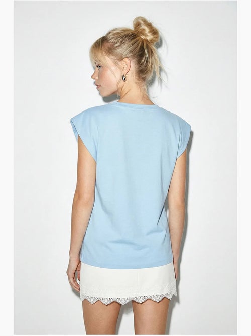 T-shirt girocollo con cut-out lucci - Kiabi T-shirt girocollo con cut-out lucci - Kiabi