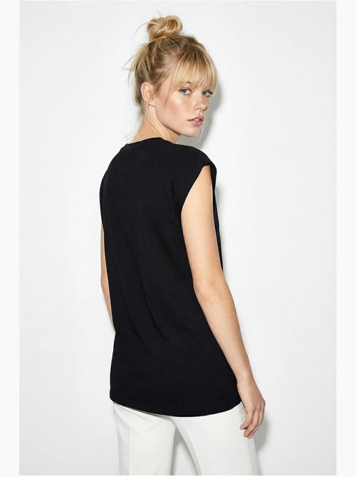 T-shirt girocollo con cut-out lucci - Kiabi T-shirt girocollo con cut-out lucci - Kiabi